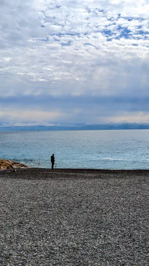 Fisherman on the promenade