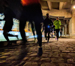 Running by the louvres cobbles